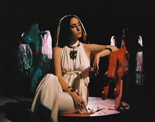 STACEY DROPS “UPSIDE DOWN MERRY GO ROUND”